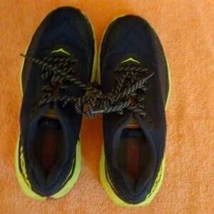 Lady's Hoka athletic shoes, gently used size 7, black, yellow